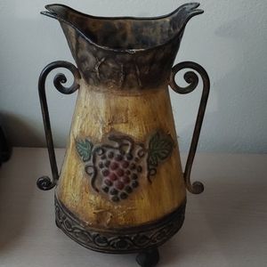 Decorative hammered metal pitcher